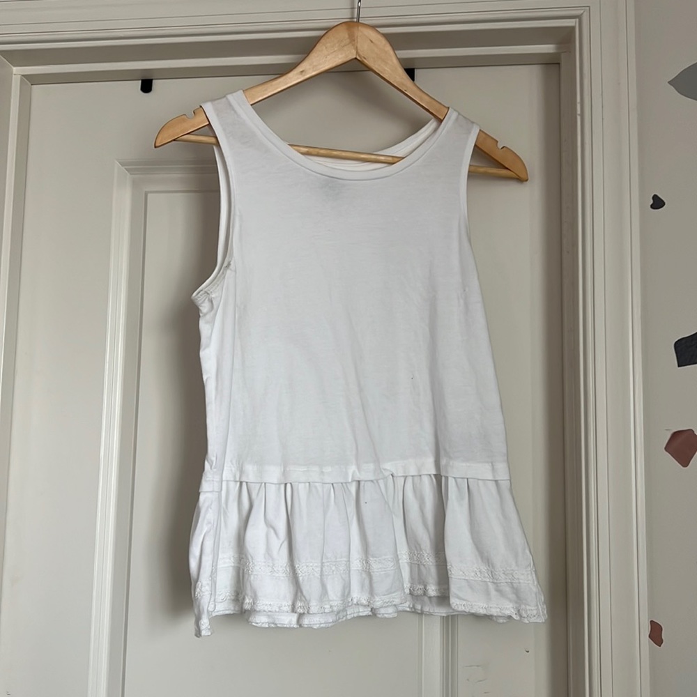 White peplum top